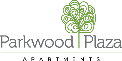 A logo with a tree and the words "Parkwood Plaza" in front of it.